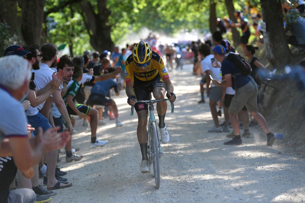 SIENA ITALY AUGUST 01 Wout van Aert of Belgium and Team JumboVisma Dust Fans Public during the Eroica 14th Strade Bianche 2020 Men a 184km race from Siena to SienaPiazza del Campo StradeBianche on August 01 2020 in Siena Italy Photo by Tim de WaeleGetty Images