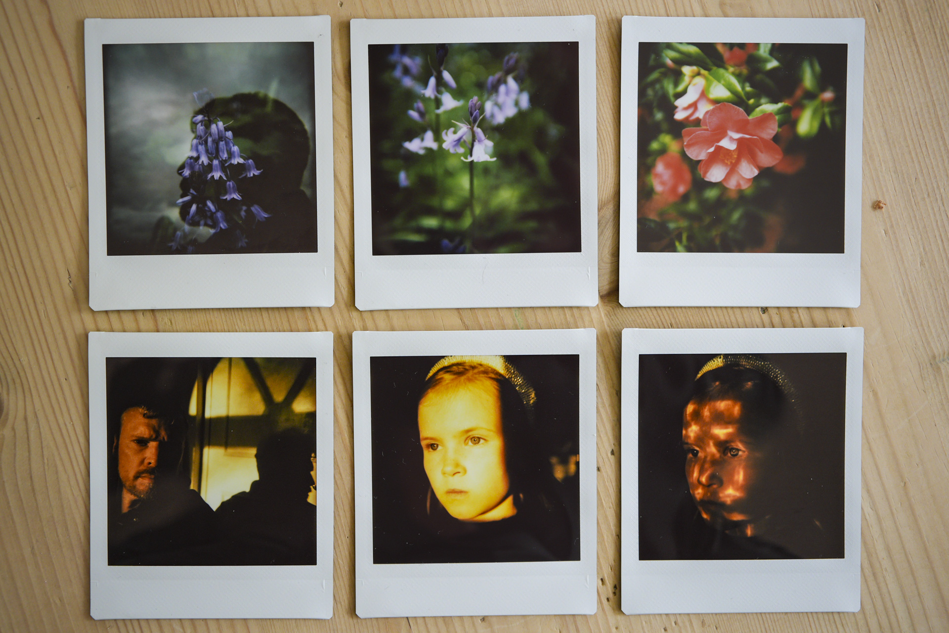 Flat lay of six instant prints taken with the Nons SL660 instant camera