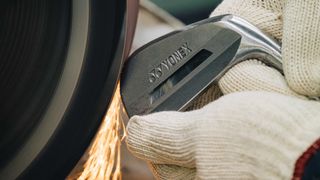 Photo of a Yonex iron head being ground