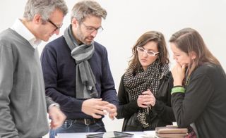 people talking around a table