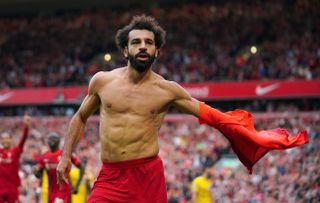 Liverpool’s Mohamed Salah celebrates scoring their side’s second goal of the game during the Premier League match at Anfield, Liverpool. Picture date: Saturday September 18, 2021