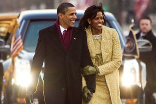 Barack and Michelle Obama walk down Pennsylvania Avenue during the Inaugural Parade, January 2009
