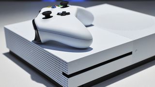 Image of Xbox One S and an Xbox Wireless Controller in Robot White.