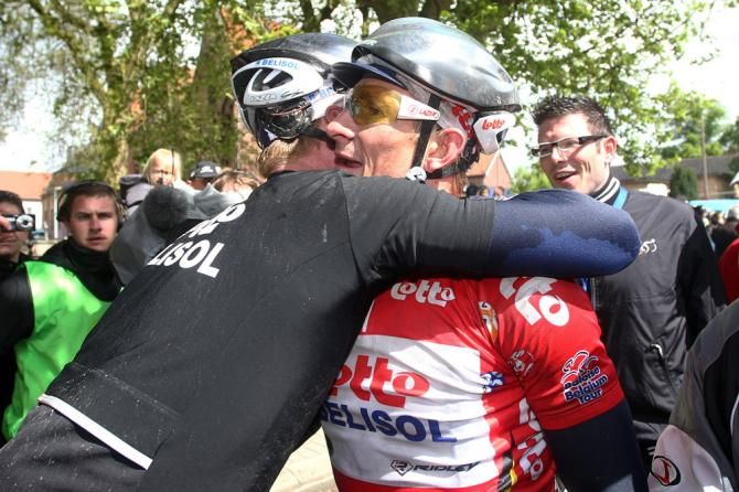 Stage 2 winner Andre Greipel (Lotto Belisol) is congratulated by a teammate