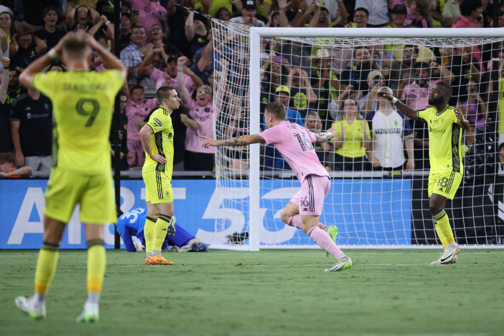 Inter Miami forward Lionel Messi (10) celebrates a goal as Nashville SC forward Sam Surridge (9) looks on during the Leagues Cup final between Nashville SC and Inter Miami, August 19 at GEODIS Park in Nashville, Tennessee