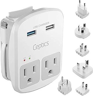 A white Ceptics World Travel Adapter Kit with five removable plugs