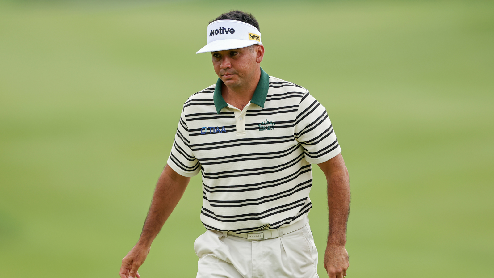 Jason Day reacts to a missed putt