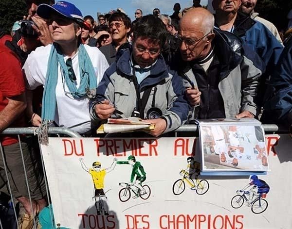 The fans were excited that the Tour started in their town. There was a tremendous number of people on the side of the road.
