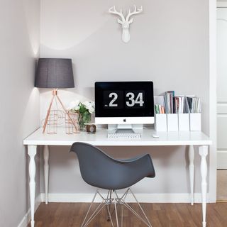 study room with white table and chair and wooden flooring