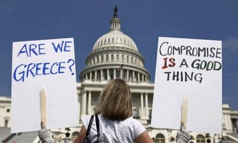 A demonstrator in front of the Capitol on Monday: A new deficit-reduction proposal from the Senate&amp;#039;s bipartisan &amp;quot;Gang of 6&amp;quot; has the potential to end the debt-ceiling standoff with a rare Gran