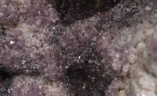 Closeup image of crystals in different shades of grey