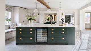 large green kitchen island with window seat