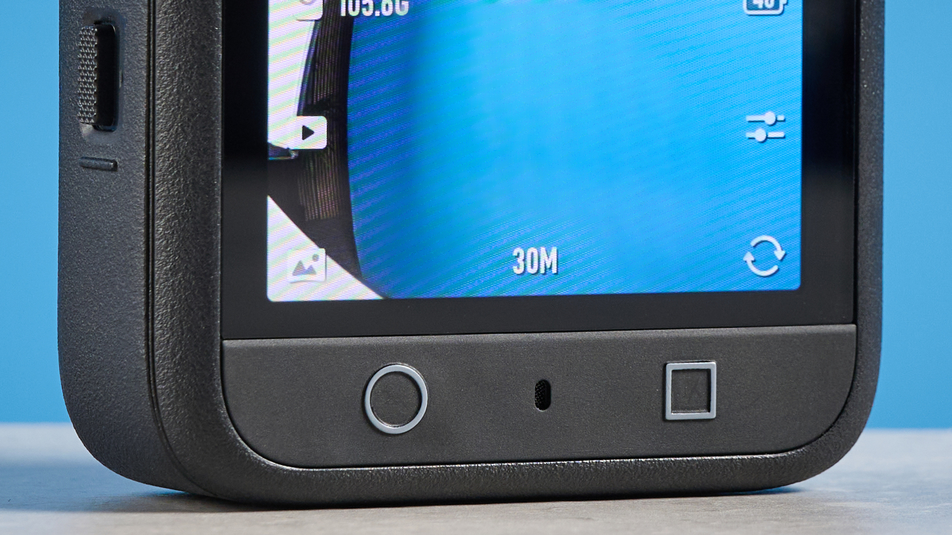 The DJI Osmo 360 buttons against a blue background