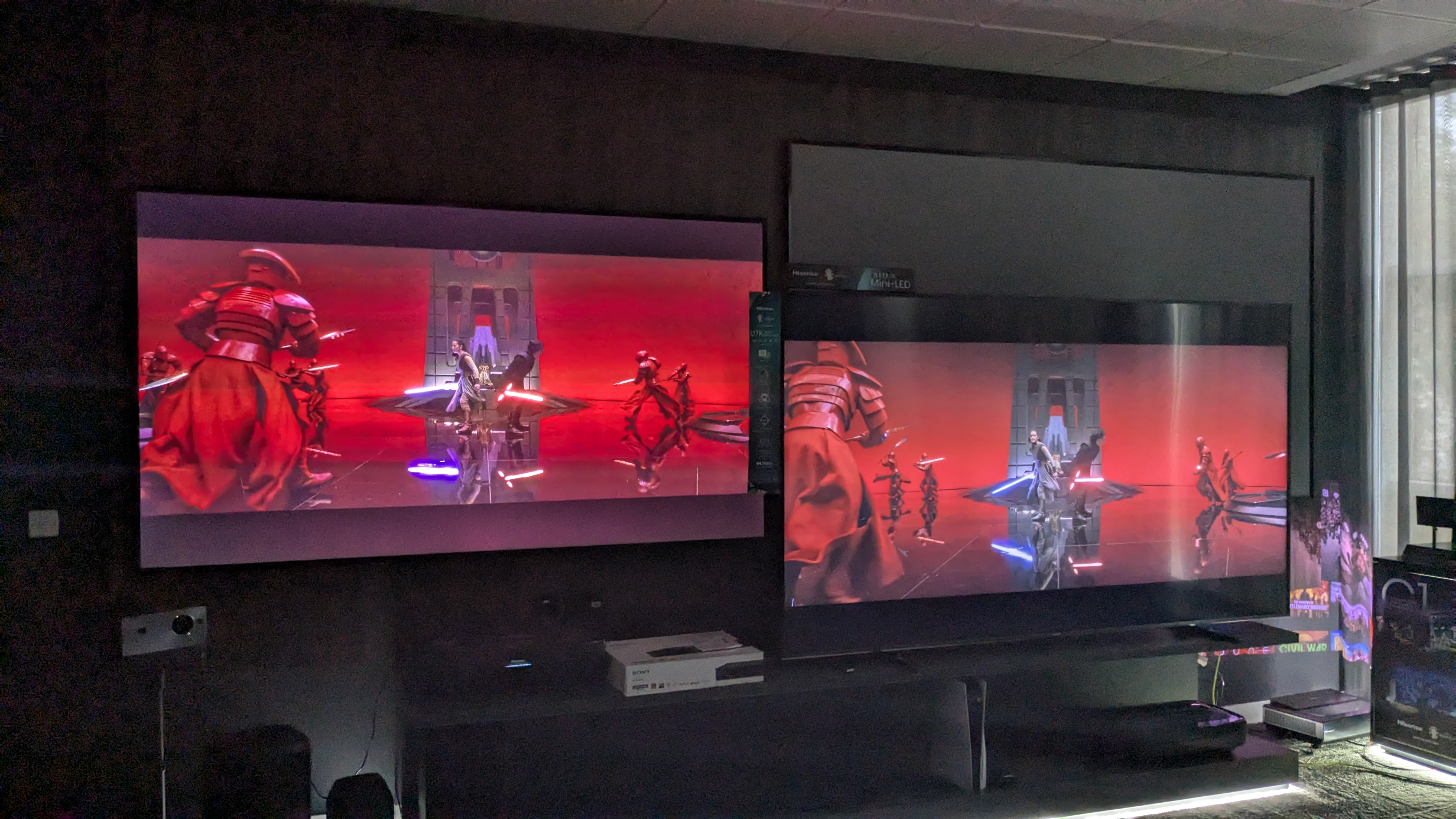 Hisense L9H next to Hisense U7K TV showing Star Wars The Last Jedi on screen