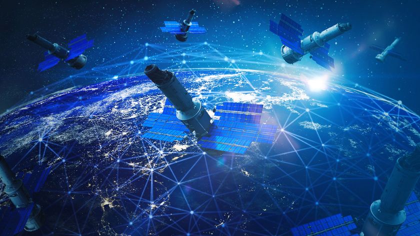 An illustration showing various satellites with solar panels on either side hovering over Earth