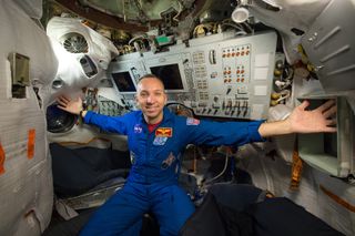 Expedition 52 flight engineer Randy Bresnik of NASA poses inside a Soyuz simulator at the Gagarin Cosmonaut Training Center in Star City, Russia.