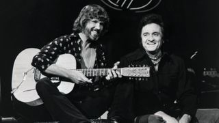 Kris Kristofferson (left) and Johnny Cash perform a duet on "The Johnny Cash Show," September 15, 1976.