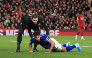 Dominic Calvert-Lewin, right, reacts after failing to connect properly with a diving header