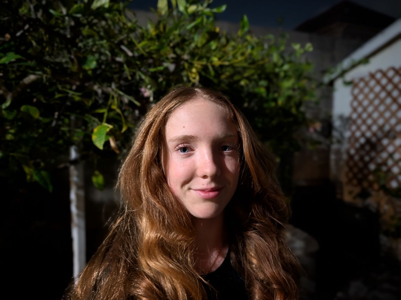 night portrait of teenager by pixel 10 pro