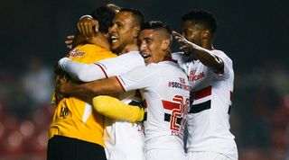 Rogerio Ceni celebrates with Sao Paulo team-mates in a match against Santos in 2015.