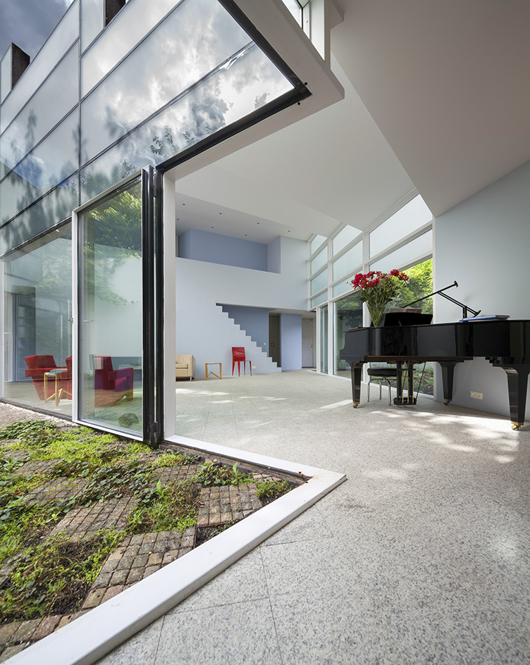 white geometric shapes of Modernist Utrecht house by Mart van Schijndel