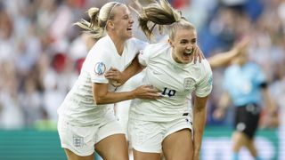 Georgia Stanway celebrates with Beth Mead of England after scoring their team's first goal from the penalty spot during the UEFA Women's Euro 2022
