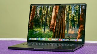 MacBook Pro 14-inch (2024, M4) shown open on a table