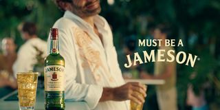 Ogilvy advers for Jameson that says 'must be a Jameson' with a person and a bottle of Jameson