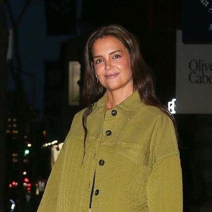 Katie Holmes wearing an olive green Everlane jacket 