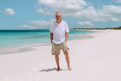 Robert de Niro in a Barbuda white sandy beach