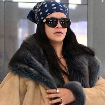 Rihanna was spotted at the airport in Jennifer Lawrence's favorite airport book tote bag from Dior