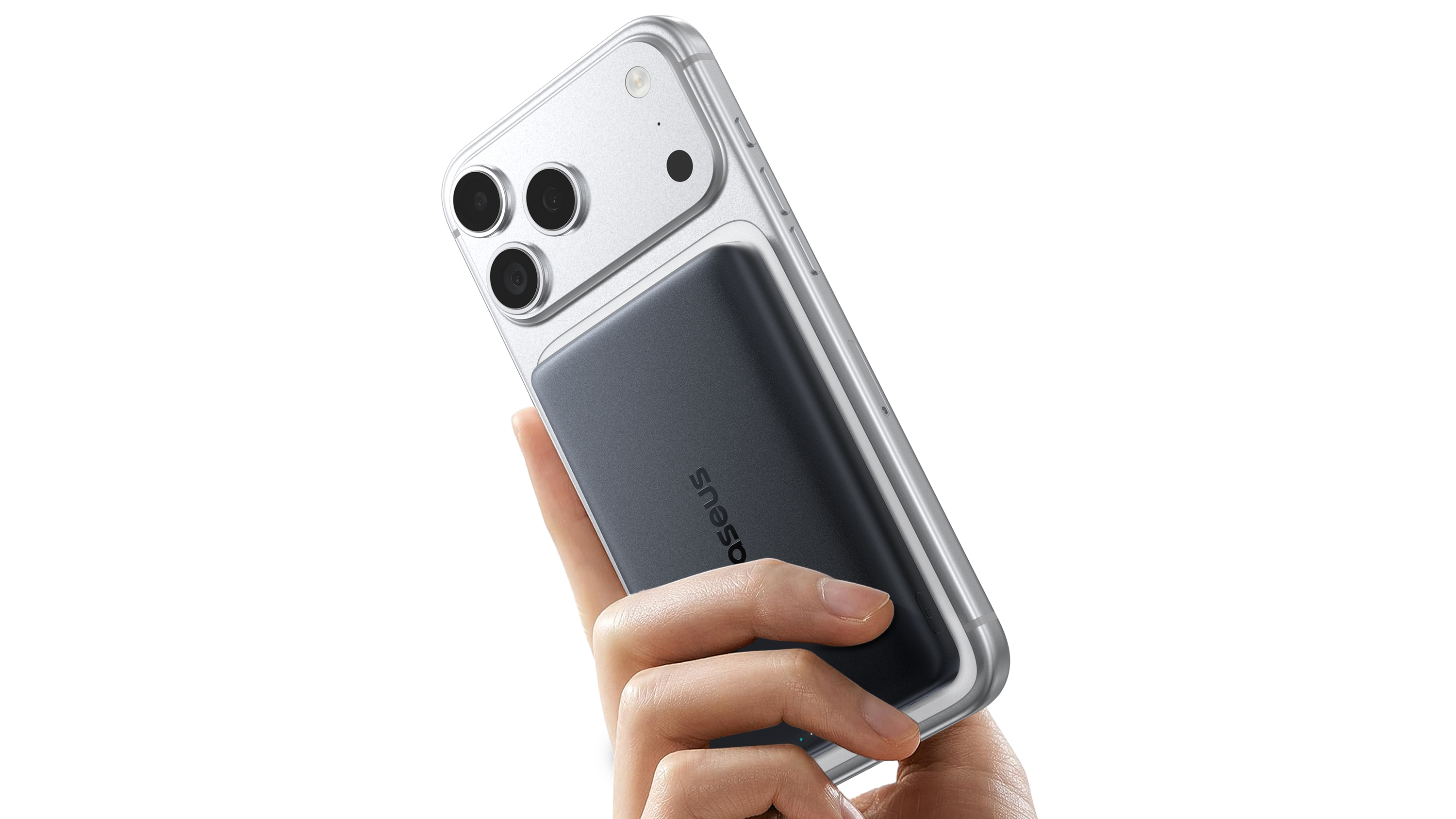 A person holds a phone with the Baseus PicoGO power bank attached.