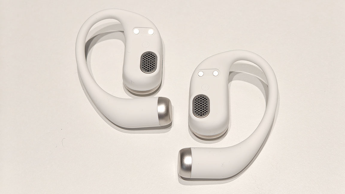 Ugee FreSound; open earbuds on a white table