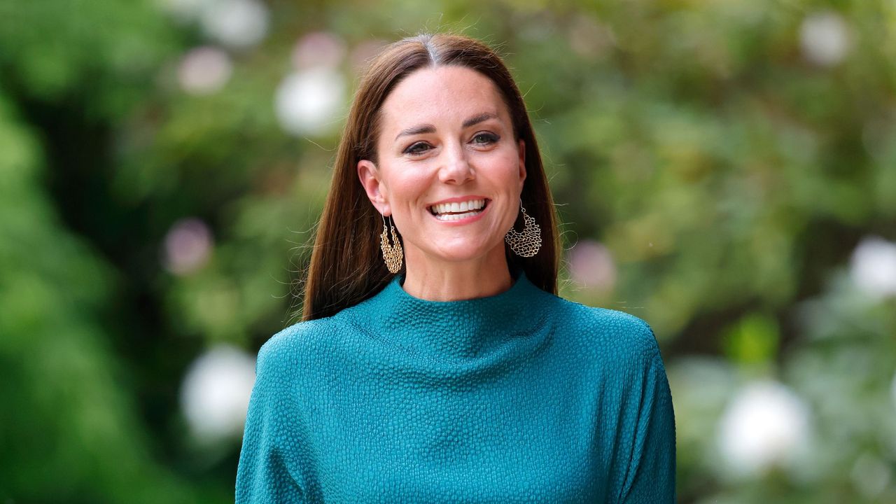 Kate Middleton arriving at the Design Museum in a jewel green dress to present The Queen Elizabeth II Award for British Design