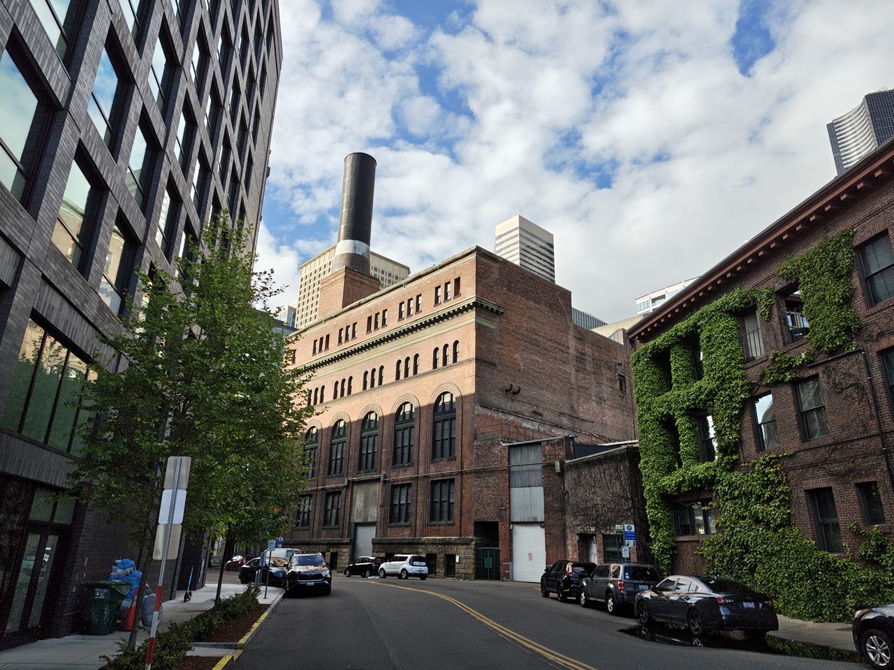 A brick building with a smokestack on top