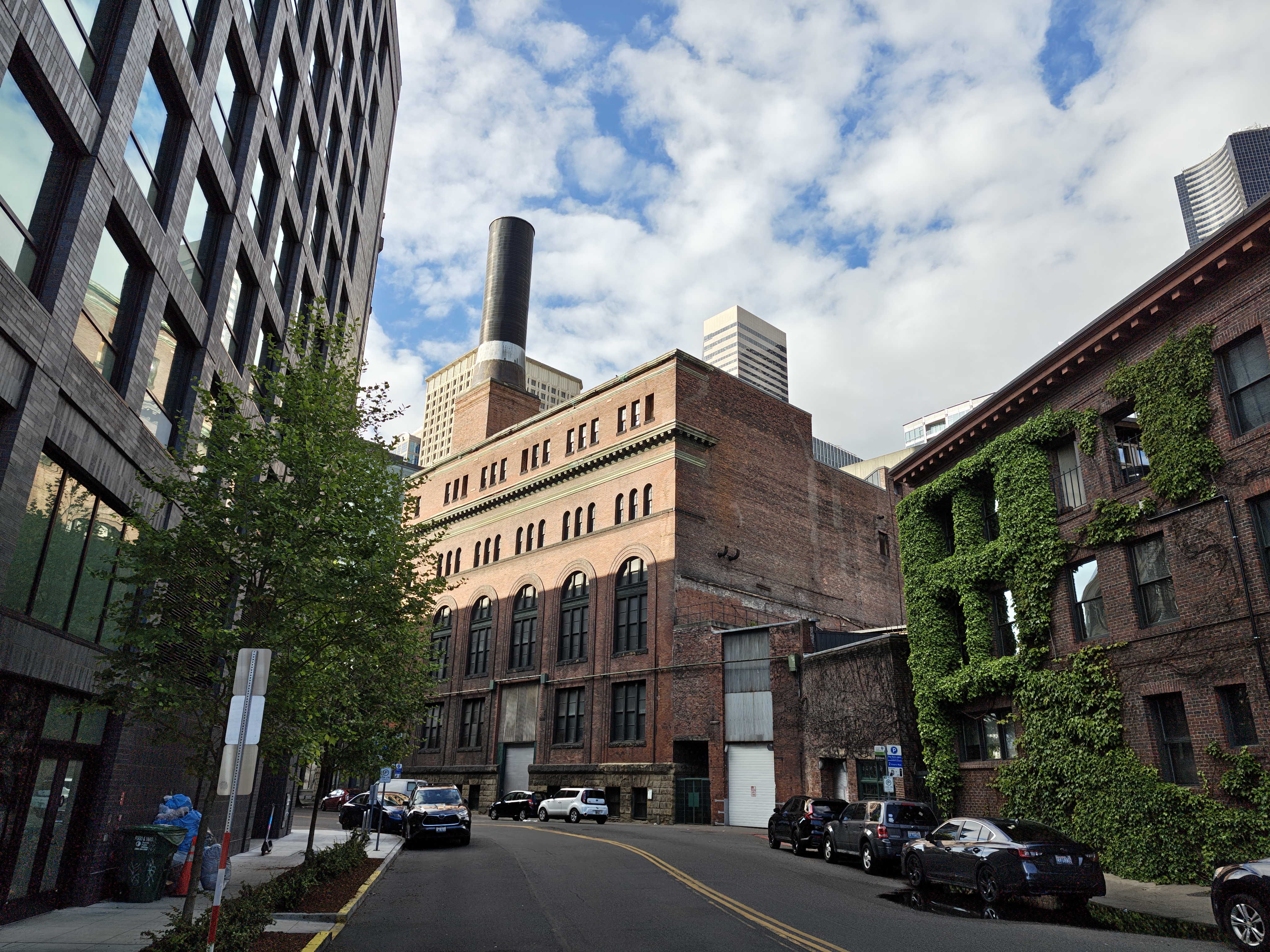 A brick building with a smokestack on top