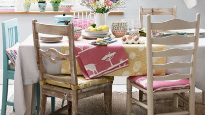 dining room with dining table and flower vase