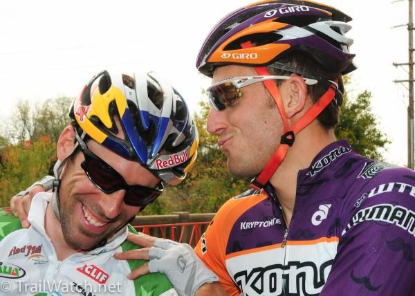 Ryan Trebon (Kona) attempts to kiss Tim Johnson at the starting line.