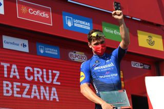 SANTA CRUZ DE BEZANA SPAIN AUGUST 31 Fabio Jakobsen of Netherlands and Team Deceuninck QuickStep celebrates at podium as stage winner during the 76th Tour of Spain 2021 Stage 16 a 180km stage from Laredo to Santa Cruz de Bezana lavuelta LaVuelta21 on August 31 2021 in Santa Cruz de Bezana Spain Photo by Tim de WaeleGetty Images