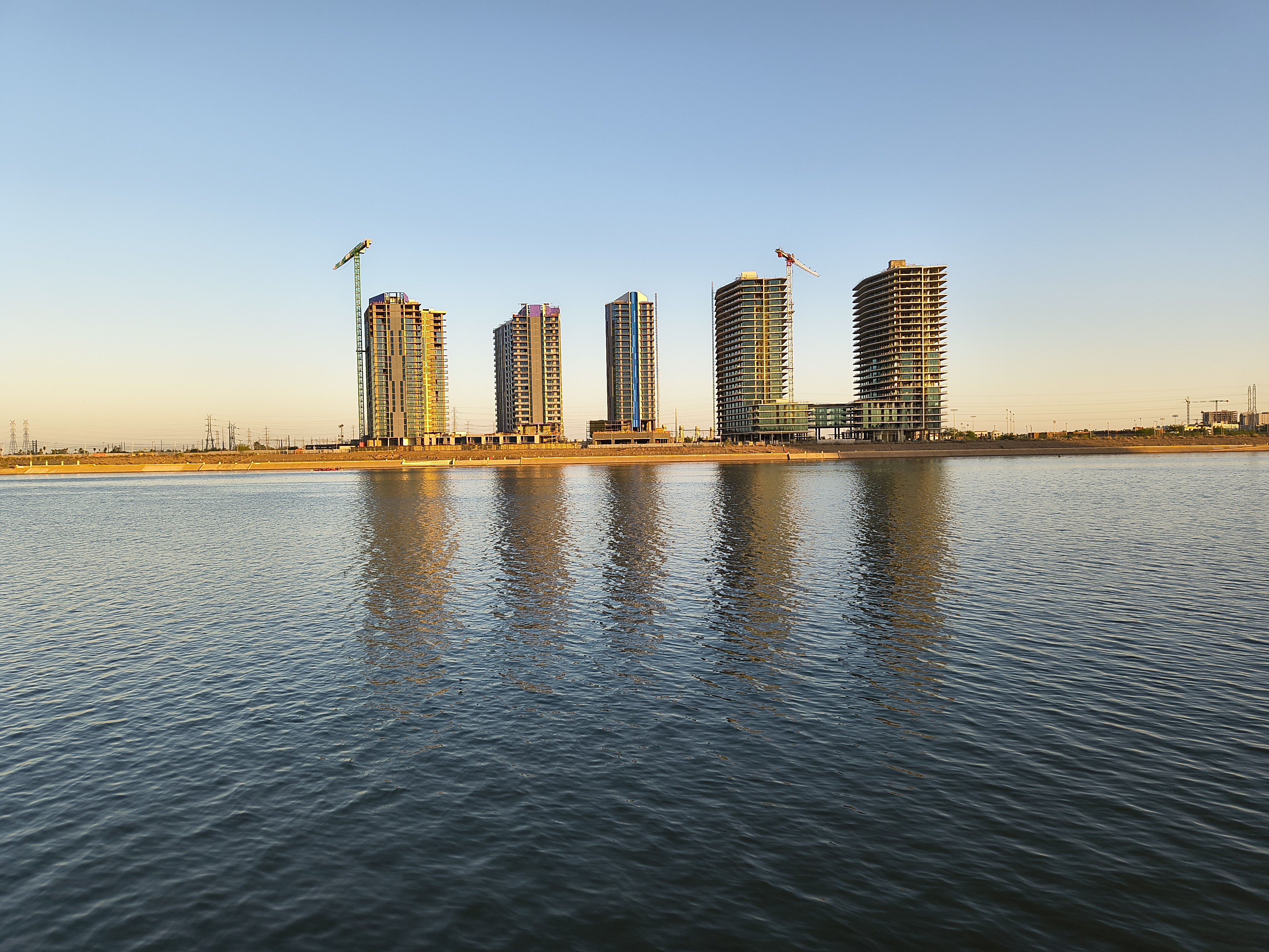 A photo of a lake and buildings captured with the Motorola Razr 2025 at 1x zoom.