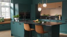 A dark green kitchen with quartz countertop