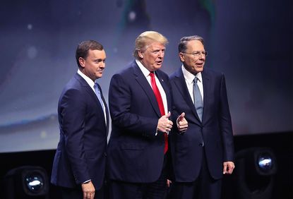 NRA leaders pose with Donald Trump