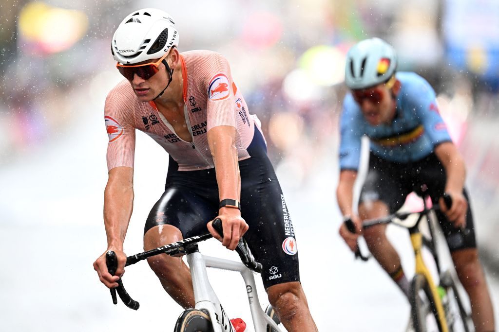 Netherlands Mathieu van der Poel L takes part in the mens Elite Road Race at the Cycling World Championships in Edinburgh Scotland on August 6 2023 Photo by Oli SCARFF AFP Photo by OLI SCARFFAFP via Getty Images