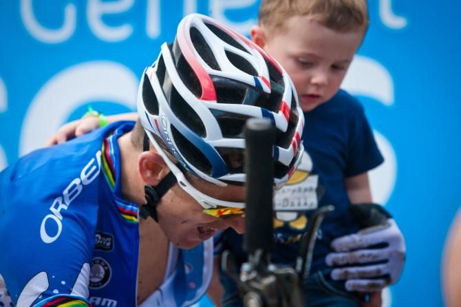 Good job, Daddy! Julien Absalon and his son at the finish of La Bresse World Cup