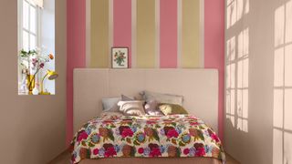 bedroom with pianted stripe feature wall behind the bed using Wild Wonder Dulux Colour of the Yeat 2023