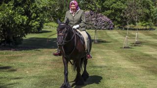 Queen Elizabeth II rides Balmoral Fern, a 14-year-old Fell Pony, in Windsor Home Park