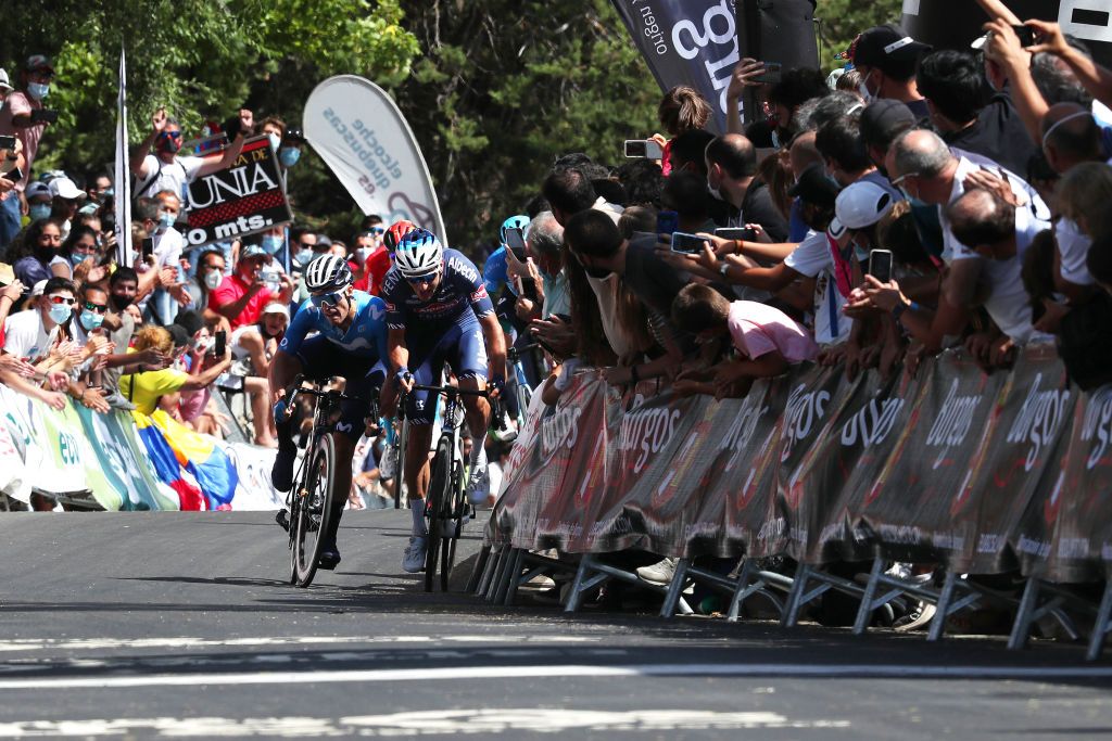 BURGOS SPAIN AUGUST 03 LR Gonzalo Serrano of Spain and Movistar Team Planckaert Edward of Belgium and Team AlpecinFenix sprint fighting at finish line during the 43rd Vuelta a Burgos 2021 Stage 1 a 161km stage from BurgosCatedral to BurgosAlto del Castillo 980m VueltaBurgos BurgosCycling CapitalMundialdelCiclismo catedral2021 on August 03 2021 in Burgos Spain Photo by Gonzalo Arroyo MorenoGetty Images