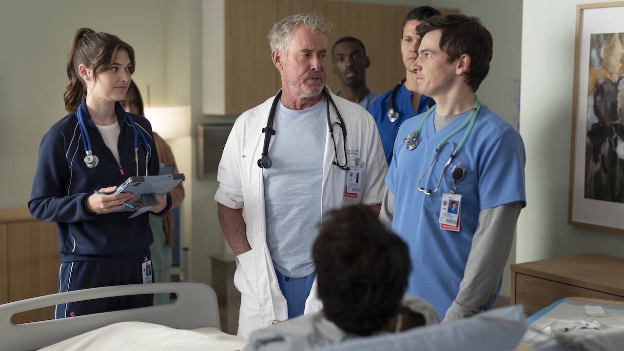 Dr. Cox with interns inside of a patient's room in Scrubs revival