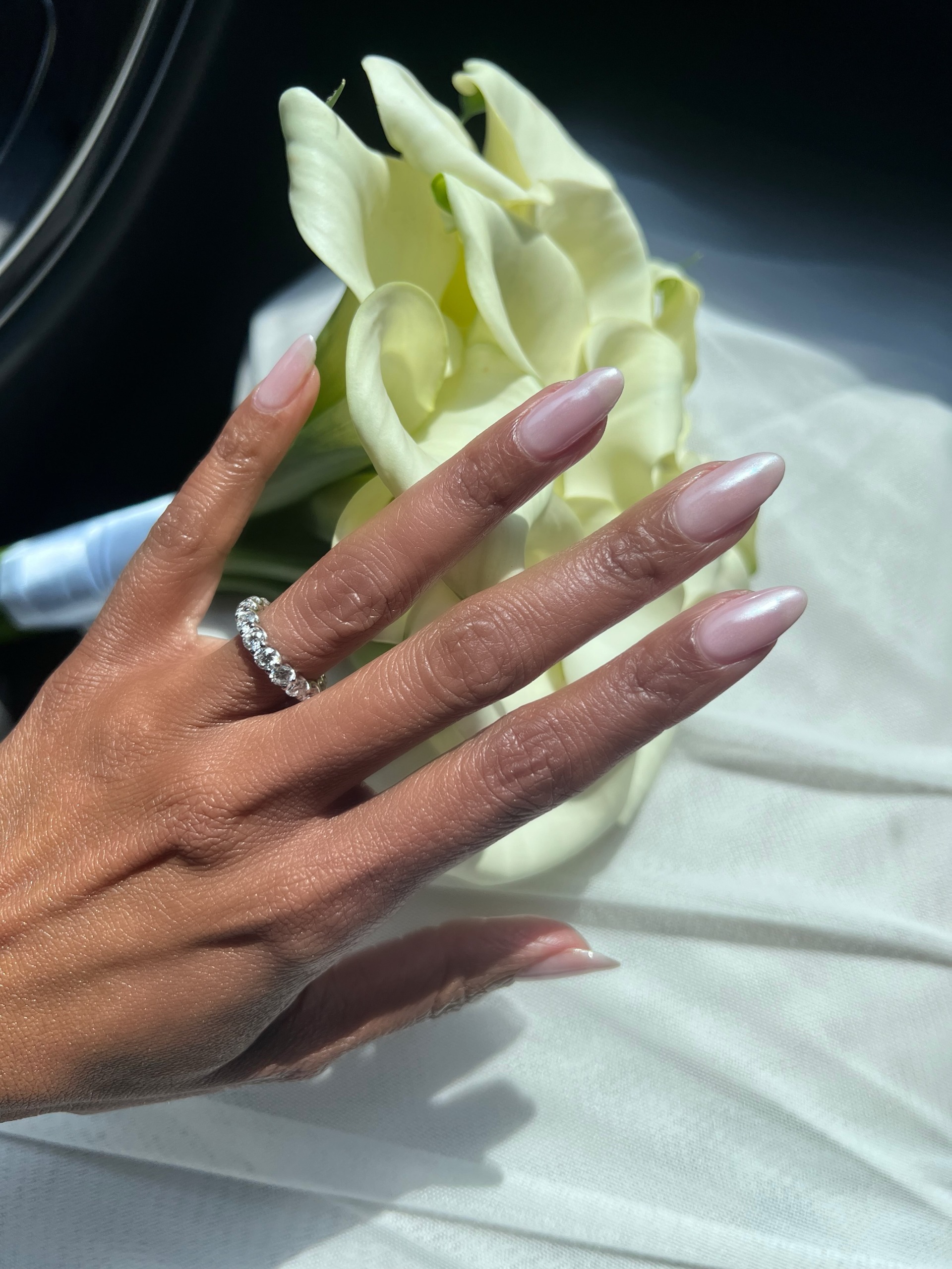 Pink chrome engagement nails.