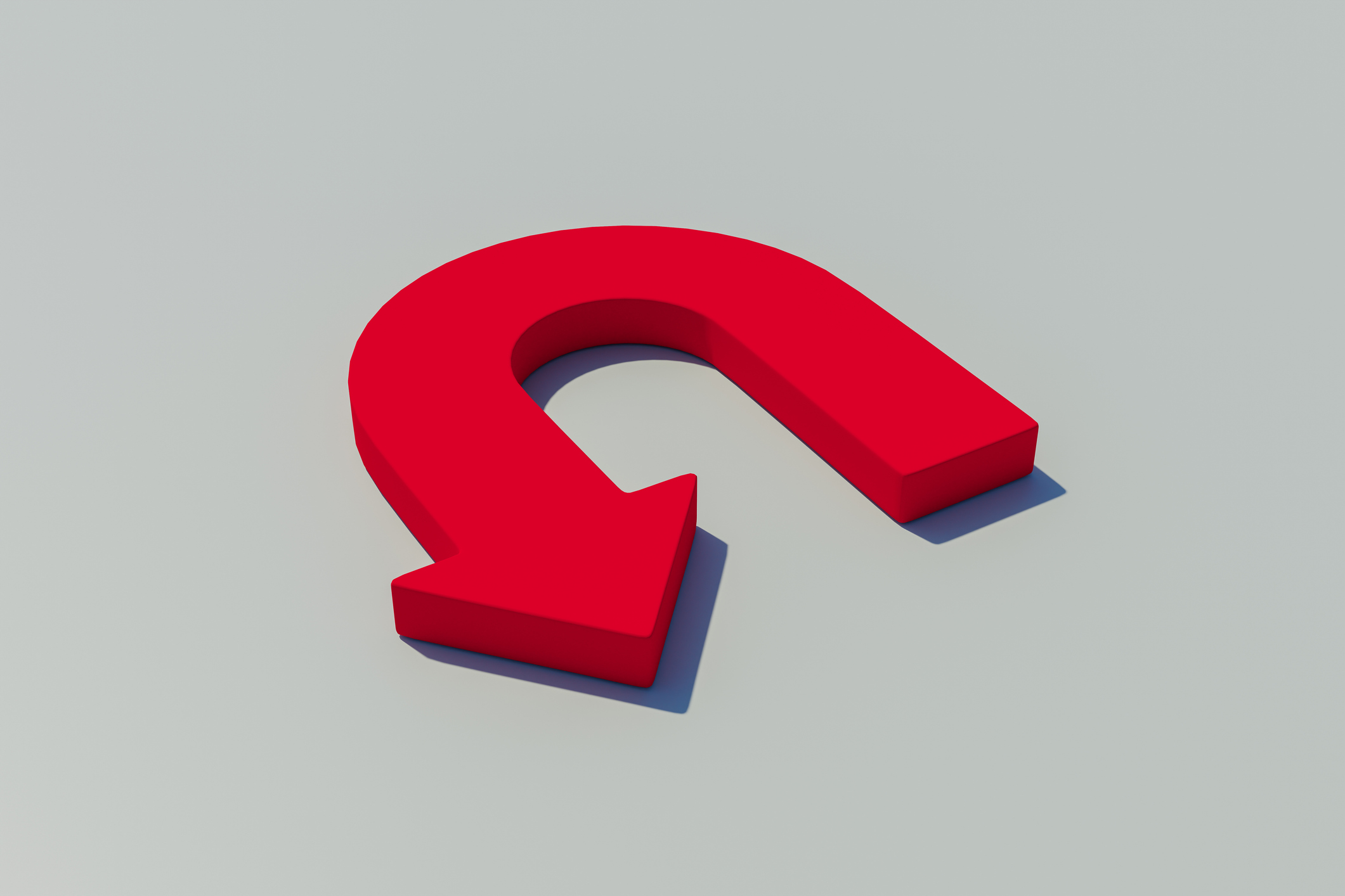 red u-shaped arrow on a gray background
